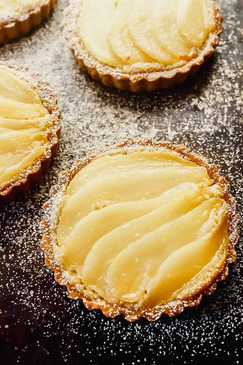 Mini Pear and Almond Tartlets, also known as Pear and Frangipane! Made with whole wheat tart crust, these sweet tarts are perfect for the holidays! | Zestful Kitchen #frangipane #pearfrangipane #peartart #peartartlets #pearalmondtart Almond Tartlets, Cranberry Curd Tart, Lemon Rhubarb, Almond Tarts, Cranberry Curd, Turkey Roasted, Pear And Almond Tart, Almond Tart Recipe, Potato Au Gratin