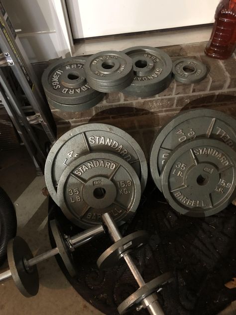 All of these plates the dumbbell bars and a bench press bar for $100 - Best deal so far for me!! Gym Shed, Gym Lifting, Home Gym Garage, Gym Garage, Power Lifting, Gym Memes, Fitness Blogger, Gym Stuff, Bench Press