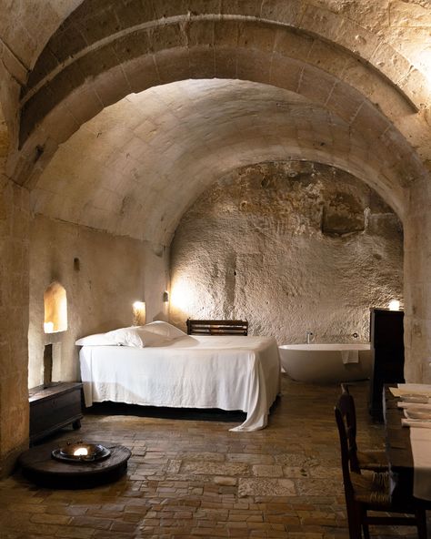 Discover the most luxurious cave hotel in Matera: the Sextantio "Le Grotte della Civita", a scattered hotel located in the city's Sassi. Converted Church, Doomsday Bunker, Unusual Hotels, Cave Hotel, Winter Mountains, Cave Home, Italian House, Cave House, Medieval Life