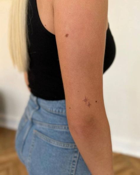 Sticker Sleeve Minimalist, Stars Elbow Tattoo, Tiny Tattoos Back Of Arm, Tiny Stars Tattoo Arm, Upper Back Fine Line Tattoo, Dainty Tattoo Above Elbow, Tattoo Right Above Inner Elbow, Dainty North Star Tattoo, Back Of Arm Star Tattoo