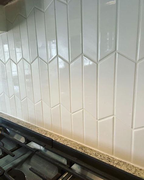 Backsplash With Granite Countertops, Backsplash With Granite, Chevron Tiles, Chevron Backsplash, Gray Grout, Backsplash Design, Chevron Tile, Grey Grout, Rectangle Tiles