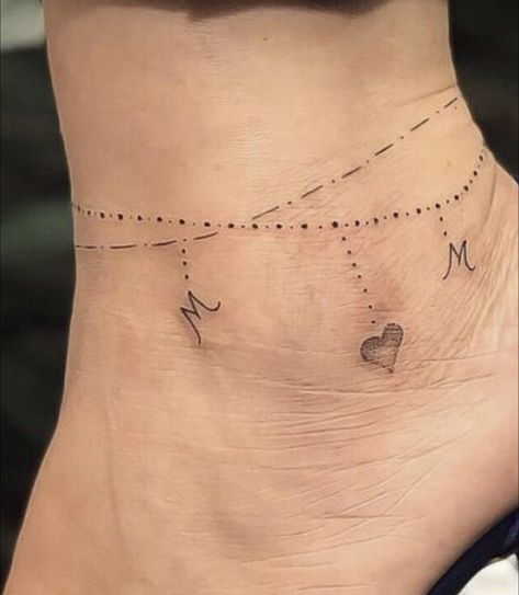 Feminine Mom Tattoos, States Tattoo Ideas, Simple Line Tattoos Minimalist, Ankle Charm Tattoo, Places To Tattoo A Name, Anklet Tattoos For Women Unique, Unique Tattoos For Moms With Kids, Dainty Tattoos For Moms With Kids, Cute Ankle Tattoos For Women