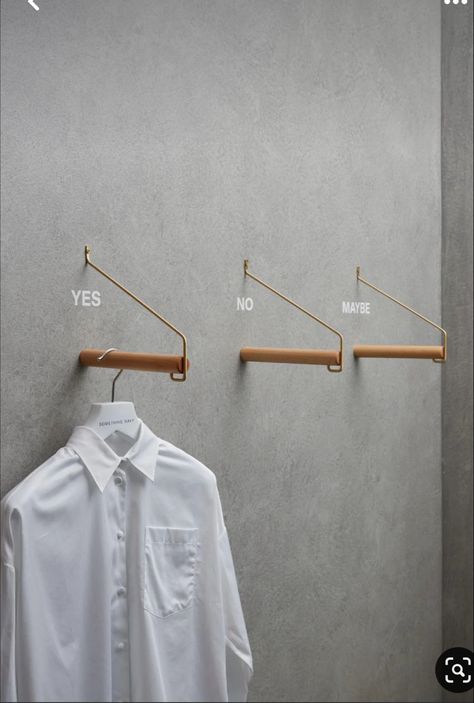 Minimalist Retail Design, Wall Clothing Rack, Laundry Idea, Wall Clothes Rack, Clothes Rack Design, Industrial Laundry, Closet Idea, Womens Business, Clothing Racks