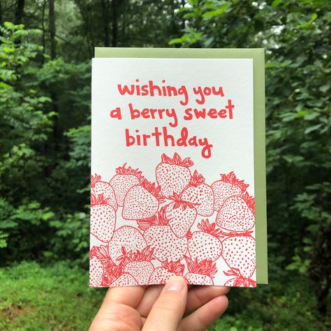 This sweet birthday card for summer birthdays features hand-drawn home-grown strawberries. Hand-drawn images and typography are letterpress-printed in red ink (color varies from card to card). The interior is blank. This single greeting card includes an avocado green envelope. -------------- This unique greeting card was printed with love using an antique letterpress machine. Read more about the letterpress process below. CARD 100% Cotton paper Pearl White Folded A6 (4.625 x 6.25) Blank interior Strawberry Birthday Card, Birthday Card Hand Drawn, Berry Sweet Birthday, Berry Birthday, Letterpress Machine, Happy Birthday Cards Diy, Strawberry Birthday, Birthday Card Drawing, Letterpress Greeting Cards