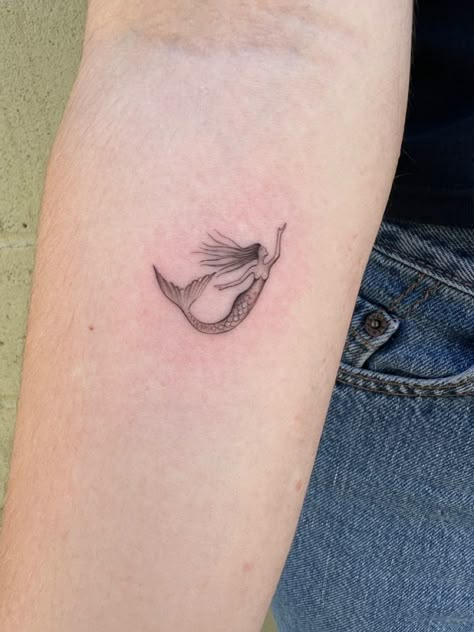 Dainty Mermaid Tail Tattoo, Micro Mermaid Tattoo, Small Tattoos Mermaid, Mermaid Behind Ear Tattoo, Subtle Mermaid Tattoo, Simple Siren Tattoo, Greek Mermaid Tattoo, Mermaid Finger Tattoo, Siren Tattoo Minimalist