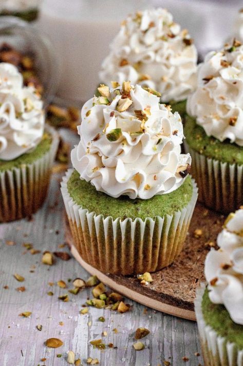 Made from scratch with 100% real pistachios, these soft and fluffy pistachio cupcakes are full of warm pistachio flavor. Topped with the most incredible whipped cream cheese frosting, they are the perfect cupcake treat. Bonus: the recipe can be made gluten-free, dairy-free, vegan, or plain regular. Pistachio Cupcakes Pudding, Pistachio Cupcake Recipe, Pistachio Pudding Cupcake Recipe, Cupcakes With Pistachio Frosting, Pistachio Cupcakes, Whipped Cream Cheese Frosting, Whipped Cream Cheese, Dairy Free Options, Made From Scratch