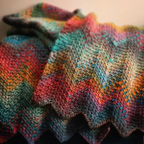 Yarnspirations | The Vibrancy! The moss stitch in this ripple throw showcases the rich jewel tones and swirling colors of the Paparazzi shade of Roll With… | Instagram Red Heart Roll With It Melange Patterns, Red Heart Roll With It Melange Crochet Patterns, Roll With It Melange Yarn Patterns, Moss Stitch Ripple Crochet, Even Moss Stitch Crochet, Moss Stitch Crochet Blanket, Coral Reef Crochet, Crochet Color Palette, Crochet Patterns Summer