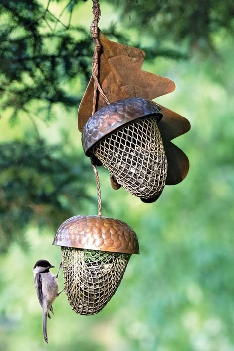 Attract some hungry feathered friends and possibly some giant killer squirrels to your backyard with these nature-inspired acorn bird feeders. Wild Bird Feeders, Diy Bird Feeder, Deco Nature, Geek Decor, Diy Birds, Bird Gifts, Humming Bird Feeders, Bird Seed, Metal Leaves