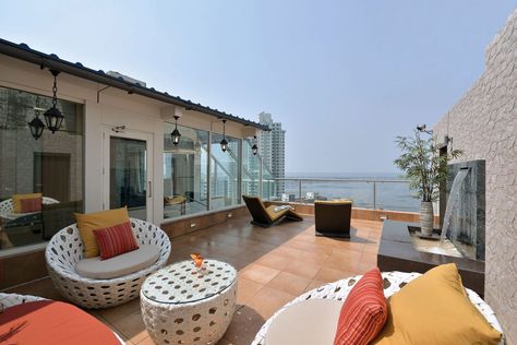 luxury penthouse Design by Space Dynamix “This 4000 sft. sea facing triplex is blessed with splendid 180 Degree views of the Arabian Sea and the focus of the space plans was to capture this in all its glory from as many areas as possible. The spaces are designed in a muted aesthetic of beige, browns[Read More] Pent House Terrace, Luxury Penthouse Design, Penthouse Exterior, Cream Living Room Decor, Small Penthouse, Pent House Design, Penthouse Decor, Japanese Interior Design Modern, Penthouse Terrace