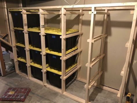 I Standardized All My Storage Bins But Got Tired Of Unstacking/Restacking Every Time I Needed Something From The Bottom Bin. I Built This Rack So Each Bin Can Slide Out, And It Wastes Very Little Storage Space. What Do You Think? Slide Out Storage Bins, 2x4 Garage Storage, Floating Bin Storage, Attic Bin Storage, Shed Interior Ideas Storage, Wood Pallet Storage Ideas, Totes Storage Shelves, Black And Yellow Tote Storage, 10x12 Storage Shed Organization Ideas