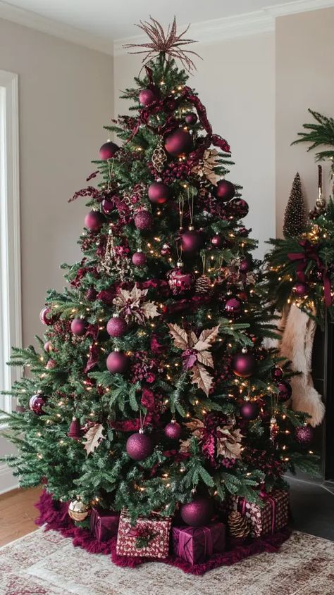 Christmas Tree Decor 2024: Must-Have Trends You’ll Love This Season - Cleve Home Living Whimsicle Christmas Tree, Mulberry Christmas Tree, Christmas Trees Decorated 2024, Wine Colored Christmas Tree, Christmas Tree 2024 Trends Decoration, Christmas Tree Theme Ideas Color Schemes, Christmas Tree Trends 2024/2025, Maroon Christmas Decorations, Themed Christmas Tree Ideas 2024