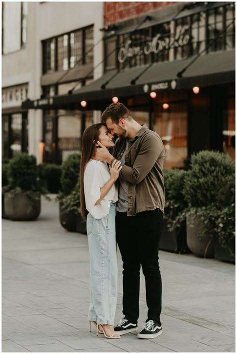 Dress up your engagement photoshoot with this casual yet sophisticated collared work top. Its loose fit offers comfort without compromising on style. #EngagementPhotoshoot #CasualChic Industrial Style Engagement Photos, Detroit Couple Photoshoot, Urban City Couple Photoshoot, Casual Engagement Pictures City, Downtown Engagement Photos Outfits, City Prenup Engagement Shoots, Engagement Pics Downtown, Old City Engagement Photos, Downtown Photoshoot Couple Engagement Shoots