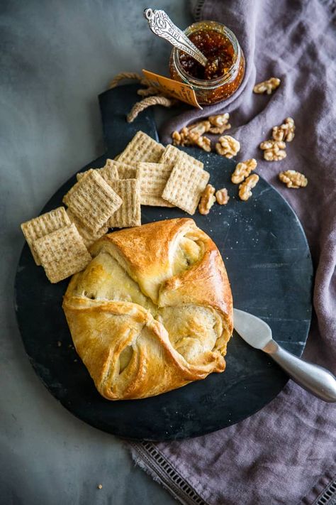 Baked brie appetizer whole on a black background Baked Brie Crescent Roll Fig Jam, Appetizers Brie, Brie Baked, Crescent Roll Bake, Baked Brie Appetizer, Creamy Brie, Ideas For Appetizers, Cream Cheese Appetizer, Brie Appetizer