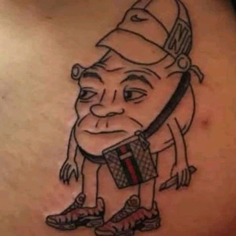 Shrek tattoo Shrek Tattoo, Funny Small Tattoos, Really Bad Tattoos, Tattoo Memes, Kraken Tattoo, Tattoo Mistakes, Horrible Tattoos, Mandala Hand Tattoos, Beginner Tattoos