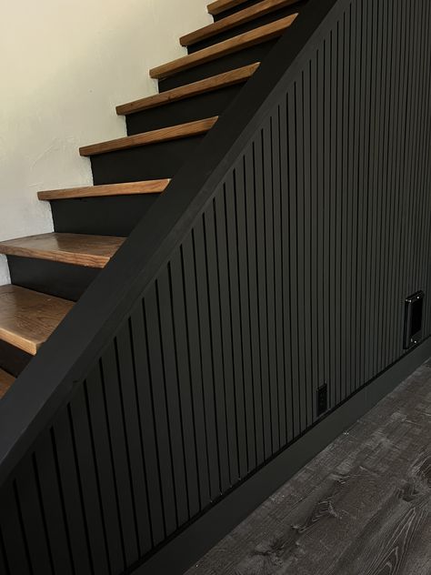 black accent wall tutorial, easy diy, diy project, slat wall, diy slat wall, pole wrap, stairway, moody decor, black wall, diy home projects, black slat wall, modern interior design, moody design, black accent wall, Black Feature Wall Staircase, Wood Slat Accent Wall Stairs, Black Slat Wall Entryway, Half Wall Around Stairs, Black Accent Wall Foyer, Industrial Shiplap Wall, Black Shiplap Stairwell, Basement Modern Farmhouse, Accent Wall Around Door