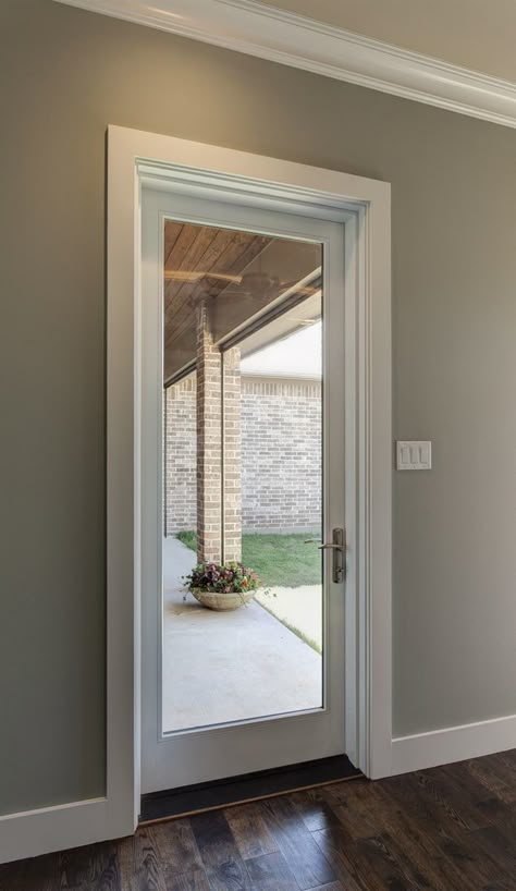 When you think of patio doors, usually they are meant only for the back of the house on the patio as the name implies. What if I were to tell you that isn’t the case? Read on for four great ideas to spark your creativity. Single Patio Door, Bedroom Door Decorations, Exterior Doors With Glass, Doors Kitchen, French Doors Patio, House Doors, French Doors Interior, Patio Door, Kitchen Doors