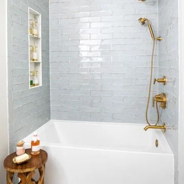 75 Alcove Bathtub with a Niche Ideas You'll Love - July, 2024 | Houzz Alcove Bathroom Ideas, Alcove Bathtub Shower Combo Tile, Alcove Tub Tile Surround, Insert Tub With Tile, White Bath Tub Tile Ideas, Tile Around Shower Insert Tub Surround, Alcove Tub Ideas, Shower Niche Placement With Tub, Shower Alcove Ideas