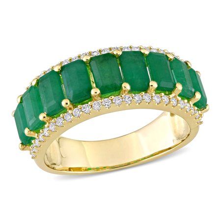 This breathtaking Miabella Emerald and Diamond Semi-Eternity Anniversary Ring is one to be cherished forever. Crafted in lustrous 14-karat yellow gold, this charming ring features nine octagon-cut, prong-set emerald gemstones (5x3mm) and 48 round-cut, buttercup-set diamonds (G-H, I1). Enhanced with a polished finish, this glistening ring is a true work of art. Nothing says 'I love you' like this gorgeous ring. Size: 8.5.  Color: Green.  Gender: female.  Age Group: adult. Emerald Band Ring, Unique Ring Designs, Diamond Anniversary Bands, Rings Vintage, Band Engagement Ring, Emerald Stone, Women Diamond, Unique Ring, Yellow Gold Ring