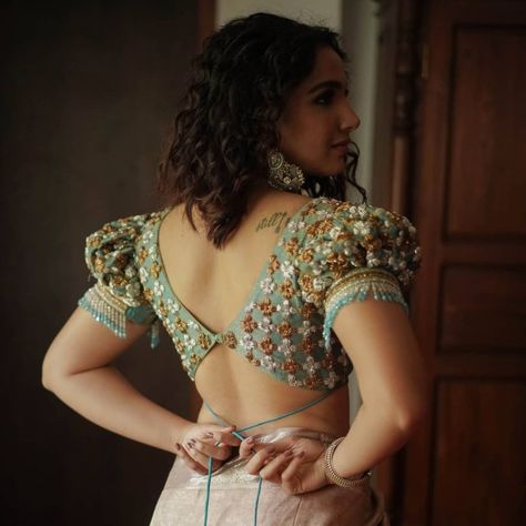 Latest and trendy designer blouses 2021 by Sruti Kannath! Choli Blouse Design, Blouse Designs Catalogue, Backless Blouse Designs, New Saree Blouse Designs, Latest Model Blouse Designs, Lehenga Blouse Designs, Fashionable Saree Blouse Designs, Blouse Back Neck Designs, Blouse Design Images