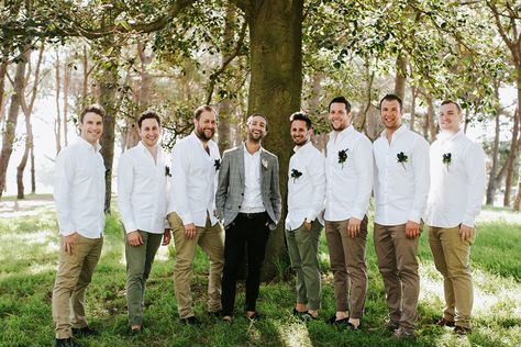 Tan, brown, and olive khaki shades keep your guys' looks in sync, while adding just a hint of casual variety. Warehouse Reception, Rustic Groomsmen Attire, Casual Wedding Ideas, Wedding Groom And Groomsmen, Greenery Pantone, Casual Groomsmen, Olive Bridesmaid Dresses, Dinosaur Wedding, Wedding Planning List