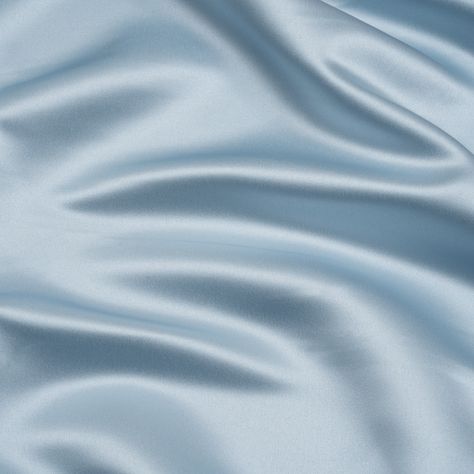 This icy Baby Blue Premium Polyester Satin has a chilly opulence. Featuring a medium weight, sleek hand, and fluid drape, it’s the perfect choice for eye-catching evening wear.Suggested Projects:  Dresses, Skirts, Blouses, ShirtsContent:  100% PolyesterStretch:  NoneOpacity:  OpaqueCome in from the cold and luxuriate in this baby blue satin. A sleek hand, lustrous face, and fluid drape combine to deliver affordable elegance to your wardrobe. This medium-weight, pale blue fabric enjoys a simple s Satin Aesthetic, Mood Designer Fabrics, Baby Blue Aesthetic, Free Sewing Pattern, Mood Fabrics, Baby Blue Colour, Blue Texture, Icy Blue, Color Analysis