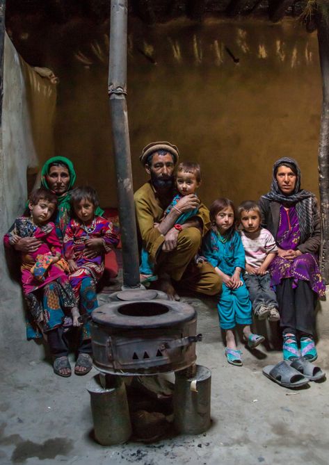 Afghan family in front of a stove, Badakhshan province, Khandood, Afghanistan Wakhan Corridor, Pashtun Culture, Afghan People, Afghanistan Culture, Afghan Culture, Family Comes First, Eric Lafforgue, Steve Mccurry, Landlocked Country