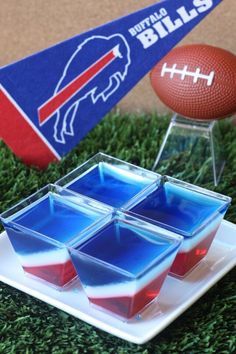 Buffalo Bills Jell-O Shots  (3 oz. box cherry Jell-O 3 envelopes Knox plain gelatin  2 1/2 cup vodka  1/2 cup milk 1/8 cup sugar 3 oz. box berry blue Jell-O Blue food coloring) Jell O Shots Recipe, Buffalo Bills Baby, Buffalo Bills Stuff, Buffalo Bills Game, Buffalo Bills Gear, Jell O Shots, Football Party Foods, Jello Shot Recipes, Buffalo Bills Football