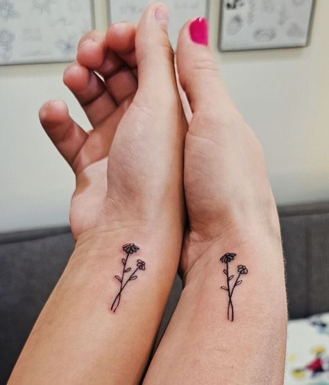 Mother Daughter Behind The Ear Tattoo, Mother Daughter Minimalist Tattoo, Tiny Mom And Daughter Tattoos, Small Tattoo For Mom, Mother Daughter Tiny Tattoos, Minimalist Mother Daughter Tattoo, Flower Mother Daughter Tattoo, Matching Mother And Son Tattoos, Mother Daughter Small Tattoos