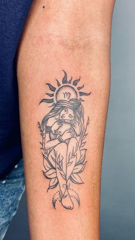 Elegant Virgo tattoo design featuring a woman cradling the Virgo zodiac symbol with the sun's rays behind her, wrapped in foliage - a serene tattoo choice for Virgo women. Virgo Tattoo Ideas For Women, Tattoo For Women Upper Arm, Feminine Tattoos With Meaning, Feminine Taurus Tattoo, Feminine Tiger Tattoo, Virgo Women Tattoo, Virgo Tattoo Ideas, Taurus Tattoo Designs, Template Tattoo