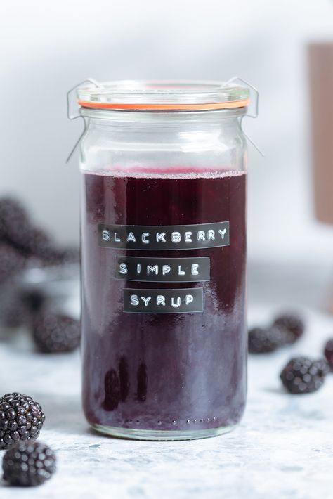 This Blackberry Simple Syrup is great for cocktails, drinks, lattes, or poured over pancakes and waffles. It's so easy to make and so delicious! You can make it with cane sugar, maple syrup, or your favorite sweetener. The perfect recipe for using all those fresh summer berries! Blackberry Simple Syrup, Pancake Syrup Recipe, Bone Apple Tea, Passion Tea Lemonade, Blackberry Margarita, Matcha Lemonade, Blackberry Syrup, Passion Tea, Cocktail Syrups