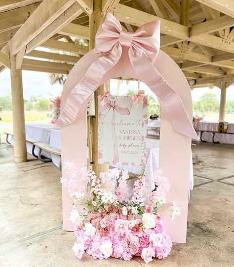 Welcome to Vanessa & Jorge’s “Love Shack Fancy” inspired baby shower 🎀🌸 This was so fun to design! The cutest baby shower theme! #loveshackfancycookies #loveshackfancy #loveshackfancytheme #loveshackfancythemedparty #loveshackfancybabyshower #loveshackfancyparty #loveshackfancybackdrop #loveshackfancybow #bowtheme #bow #floralbabyshower #bowbackdrop #largebow #pinkbow #pinkbowtheme Eloise Baby Shower Theme, Baby Shower Girl Bow Theme, Love Shack Fancy Bridal Shower Theme, Pink Bow Wedding, Pink Theme Baby Shower Ideas, Love Shack Fancy Graduation Party, Love Shack Baby Shower Theme, Rose Garden Baby Shower Theme, Love Shack Fancy Theme Party