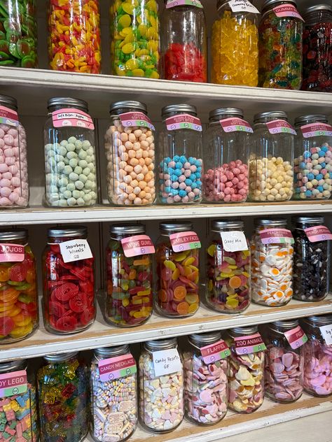 Wall of mason jars full of multicolour candy in a candy shop Academic Rivals To Lovers, Favorite Tropes, Rivals To Lovers, Candy Wall, Wine Gums, Academic Rivals, Big Pigs, Strawberry Wine, Candy Necklaces