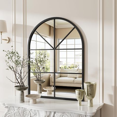 Mirror above fireplace mantle