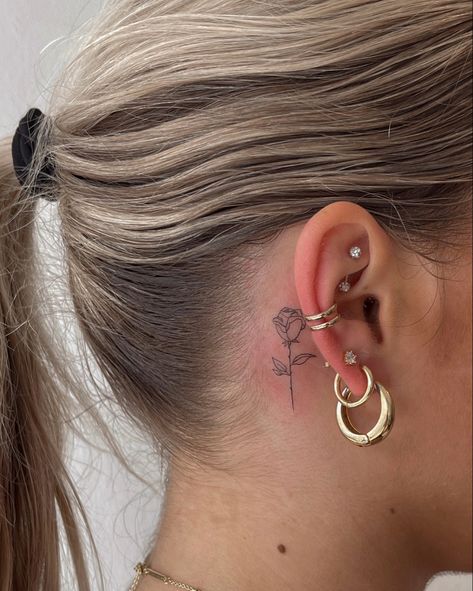 Small rose tattoo, behind the ear tattoos Fine Line Rose Tattoo Behind Ear, Small Red Rose Tattoo Behind Ear, Red Ink Rose Tattoo Behind Ear, Cute Tattoo Behind Ear, Dainty Rose Tattoo Behind Ear, Behind Ear Fine Line Tattoo, Cute Behind Ear Tattoo, Small Behind Ear Tats, Behind Ear Tattoo Rose