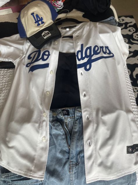 dodger game outfit inspo Outfits With Dodger Jersey, Aesthetic Baseball Game Outfit, Dodgers Game Outfit Women, Dodger Jersey Outfit Women, Jersey Baseball Outfit, Dodgers Jersey Outfit, Dodgers Game Outfit, La Dodgers Hat Outfit, Dodger Game Outfit Women