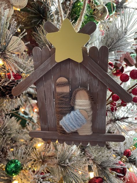 Nativity Popsicle Stick Craft, Manger Popsicle Stick Craft, Cinnamon Stick Nativity, Pop Cycle Stick Christmas Crafts, Popsicle Stick Sled Ornament, Popsicle Stick Manger Craft, Mangers Christmas Diy, Craft Stick Christmas Ornaments, Jaslice Božićne