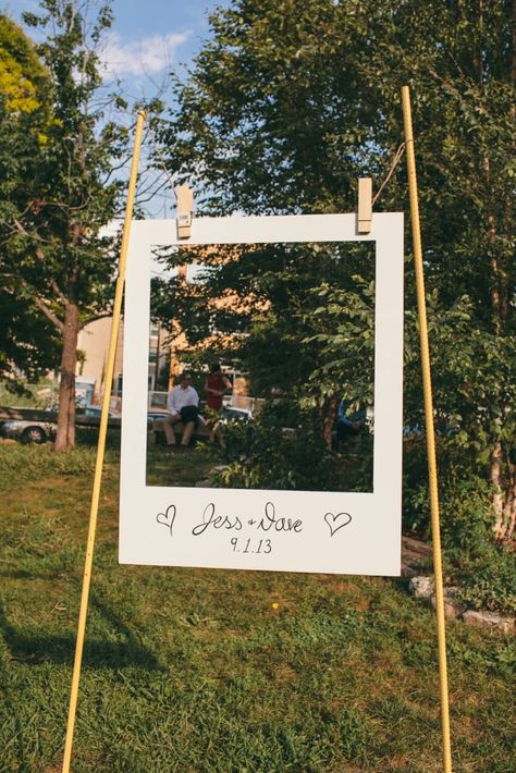 You can either set the two support poles in the ground, or put them in buckets filled with concrete (get a step-by-step in this how-to). Write your name and wedding date on the bottom of the photo frame, which you can make with poster board or foam board. Then, attach it to the poles with oversized clothespins, which you can find in most craft stores or online.Difficulty level: Jessica David, Diy Wedding Photo Booth, Photo Booth Backdrop Wedding, Rustic Wedding Decorations, Booth Backdrops, Boda Diy, Brewery Wedding, Photos Booth, Engagement Parties