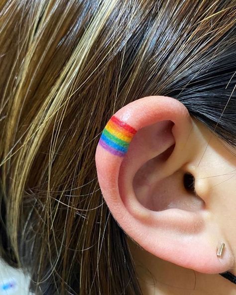 Tattoo Color Test Ideas, Ear Tattoo Rainbow, Only Color Tattoo, Pride Ear Tattoo, Pretty Color Tattoos, Rainbow Ear Tattoo, Small Color Tattoo Ideas, Small Tattoos Colorful, Non Binary Tattoo Ideas