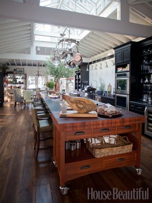 The custom butcher block safely holds knives, and has plenty of surface space for chopping. It's secured to the island with industrial-strength magnets, but because it's on wheels it's easily rolled directly up to the stove or table.  Grothouse butcher block.  HB KOTY 2012 Kitchen Island On Casters, House Beautiful Kitchens, Tyler Florence, Kitchen Island On Wheels, Style Loft, Design Your Home, Beautiful Kitchens, Dream Kitchen, A Kitchen