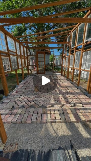 Lily & Rose on Instagram: "Been a minute since I worked on the greenhouse due to planting season and installing a drip system. But obsessed with this brick! Next up… brick and mortaring 😬   #lilyandrose #sharejoy #greenhouse #diygreenhouse #backyardblooms #flowerfarmer #brick #brickbybrick" Greenhouse Paver Floor, Brick Greenhouse Floor, Diy With Bricks, Brick Floor Greenhouse, Greenhouse Plans Old Windows, Reclaimed Window Greenhouse, Brick Conservatory, Greenhouse Floor Ideas, Brick Greenhouse