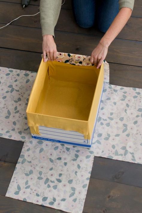 How to Make DIY Fabric-Wrapped Storage Bins | HGTV Carton Diy, Fabric Covered Boxes, Diy Storage Boxes, Fabric Storage Boxes, Fabric Storage Bins, Fabric Boxes, Diy Cardboard, Diy Interior, How To Make Diy