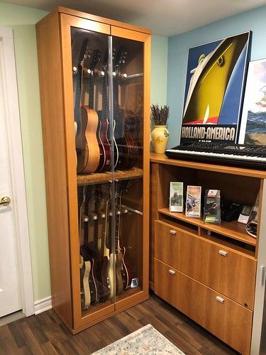 Armoire1 | Oldschool59 | Flickr Storage For Musical Instruments, Ikea Guitar Display, Storing Guitars At Home, Instrument Case Storage, Guitar Practice Room, Instrument Storage Ideas Music Rooms, Ikea Guitar Storage, Guitar Cabinet Storage, How To Store Guitars