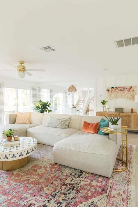 Tan Coach Living Room, Apartment Decorating Coastal Style, Bright Living Room Rug, Colorful Boho Rug Living Room, Area Rug Aesthetic, Fun Couches Living Room, Colorful Boho Design, Boho Living Room Sectional, Subtle Boho Living Room