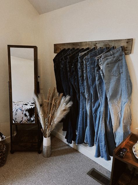 Simple Western Room Ideas Bedrooms, Western Closet Room, Western Storage Ideas, Jeans Rack Display, Bedroom Ideas Western Rustic, Jean Rack Western, Navy Blue Western Bedroom, Boho Closet Room, Western Desk Ideas