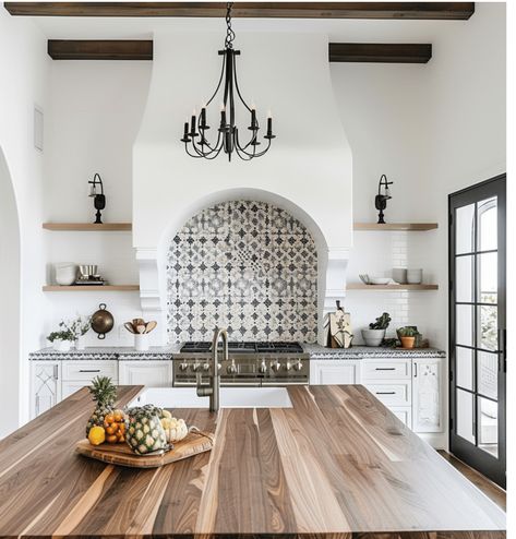 Spanish Style Laundry Room Ideas, Mediterranean Kitchen Black Countertops, Spanish Style Modern Kitchen, Kitchen Ideas Mexican Style, Spanish Kitchen Island, Modern Spanish Kitchen Design, Modern Spanish Revival Kitchen, Spanish Villa Kitchen, Tuscan Kitchen Ideas Rustic Italian