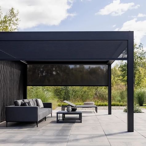 An outdoor patio with a modern black pergola. Premade garden structures with shade panels built in. Industrial Planter, Black Pergola, Garden Pavilion, Iconic Furniture, Shade Structure, Fantastic Furniture, Garden Structures, Furniture Maker, Design Board