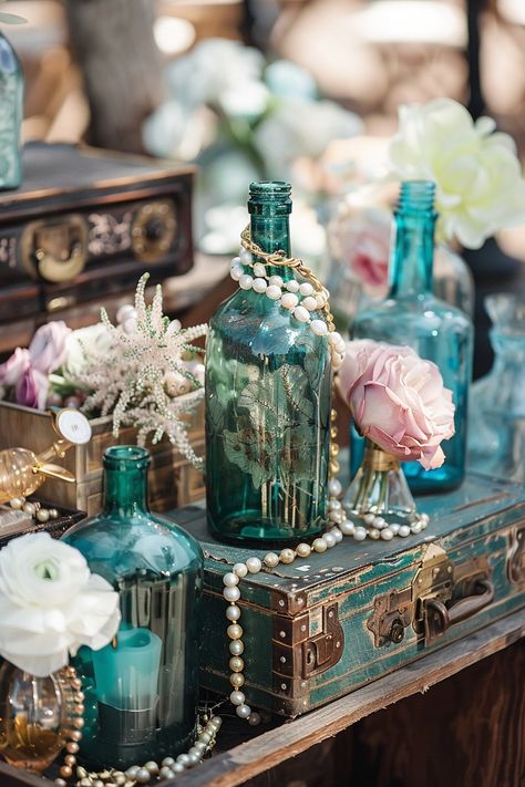 Dive into matrimonial bliss with our unique collection of nautical-themed wedding centerpieces. Think treasure chests filled with shimmering accents and bottles that whisk you away to the ocean's edge 🌊💍 Create a magical and adventurous tablescape that will enchant your guests. #WeddingInspiration #NauticalWedding #WeddingCenterpieces #TreasureDecor #BeachWeddingIdeas #RomanticWedding #UniqueWedding #TableDecor Pirate Theme Wedding Ideas, One Piece Themed Wedding, Aquatic Wedding Theme, Nautical Floral Arrangements, Pirates Of The Caribbean Wedding Theme, Ocean Themed Wedding Decorations, Treasure Chest Centerpiece, Deep Sea Wedding, Pirates Of The Caribbean Wedding