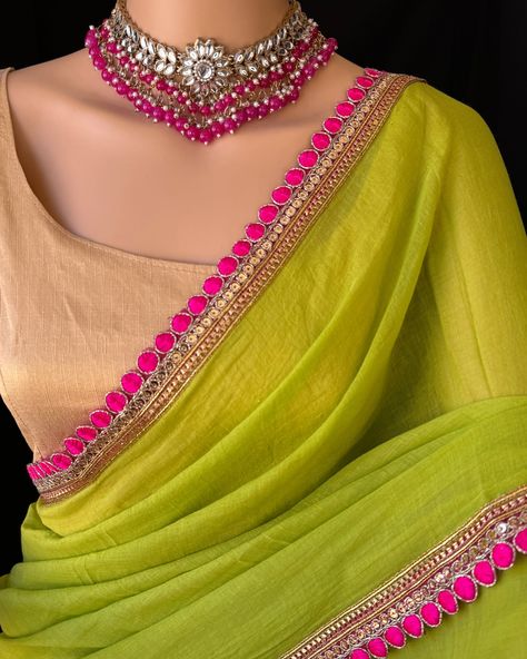 Fluorescent green mulmul cotton saree with contrast pink golden lace all over sarees. Comes with beautiful big pink thread tassels on pallu. Blouse: running blouse 80cm. To find this product in website: Www.thejacouture >cotton sarees> fluorescent green cotton saree. Jewellery collaboration: @anvi__jewellery #cottonsaree #fancysaree #trendingsaree #mulmul #mulmulcotton #greensaree #sareelove #sareestyle #sareestyle Mul Mul Cotton Saree, Green Cotton Saree, Mul Cotton Saree, Pink Blouse Designs, Thread Tassels, Saree Drape, Saree Jewellery, Golden Lace, Pink Thread