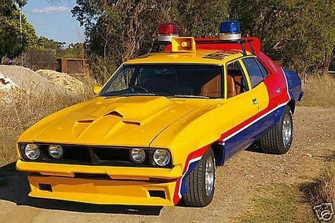 Mad Max's Yellow Interceptor (4 Door XB Sedan). This car is a Ford Falcon XB sedan, 351 V8 engine, probably a 1974 model. Max is seen driving this car before he goes "Mad", and takes off in the black Interceptor. Mad Max Film, Famous Movie Cars, Dodge Charger Models, Famous Vehicles, Mad Movies, Australian Muscle Cars, Aussie Muscle Cars, Car Max, Tv Cars