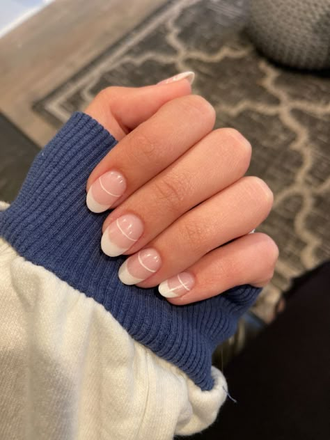 Double french tip dip nail design. Almond shape nails. Double Line French Tip Nails Short, Nails Dip Almond Shape, Almond French Tip Dip Nails, Double French Short Nails, Round Minimalist Nails, Dip Nail Designs French Tips, Almond Nails Double French Tip, Short Double French Nails, Almond Powder Nails